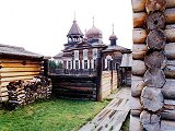 Tours to baikal: Listvyanka tours: View to the church from the backyard of the old wooden livinghouse which was build in 17th century