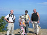 Olkhon Island tours: tourists at the northern tip of the island near the sacred place